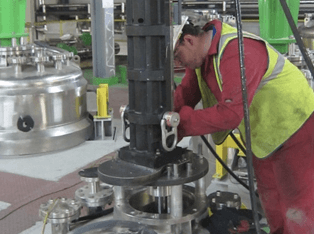 Machine being set up on the agitator motor flange Machine being set up on the agitator motor flange