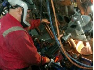engineer repairing cylinder liner